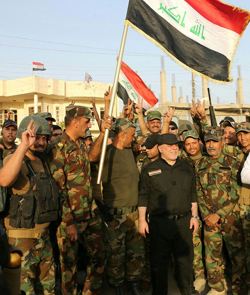 Irak'ın Anbar vilayetine bağlı Felluce'de Irak bayrağı dalgala galerisi resim 6