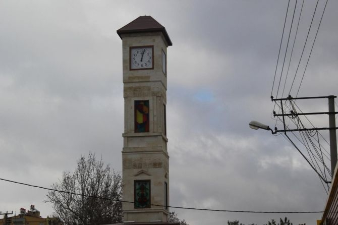 DBP'li belediyenin "Êzidilik"i simgeleyen saat kulesi tep galerisi resim 1