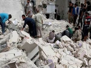 Halep'te hava saldırısında bir aileden 14 kişi öldü