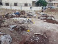 Suriye'de çuvallara konulan 35 kişinin toplu mezarı bulundu