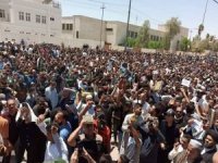 Irak'ta binlerce kişi İsveç'te Kur'an'ın yakılmasını protesto etti