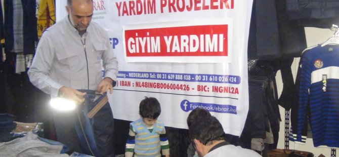 iho-ebrardan-yetimlere-giyim-yardimi2.jpg